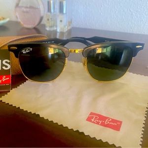 Women’s black and gold Ray-Ban sunglasses polarized
